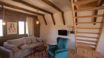 Grand Chalet, Mountain View, Mountainside | Living area | Flat-screen TV