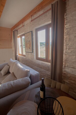 Chalet Luxe, vue montagne | Coin séjour | Télévision à écran plat
