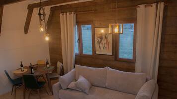 Grand Chalet, Mountain View, Mountainside | Living area | Flat-screen TV