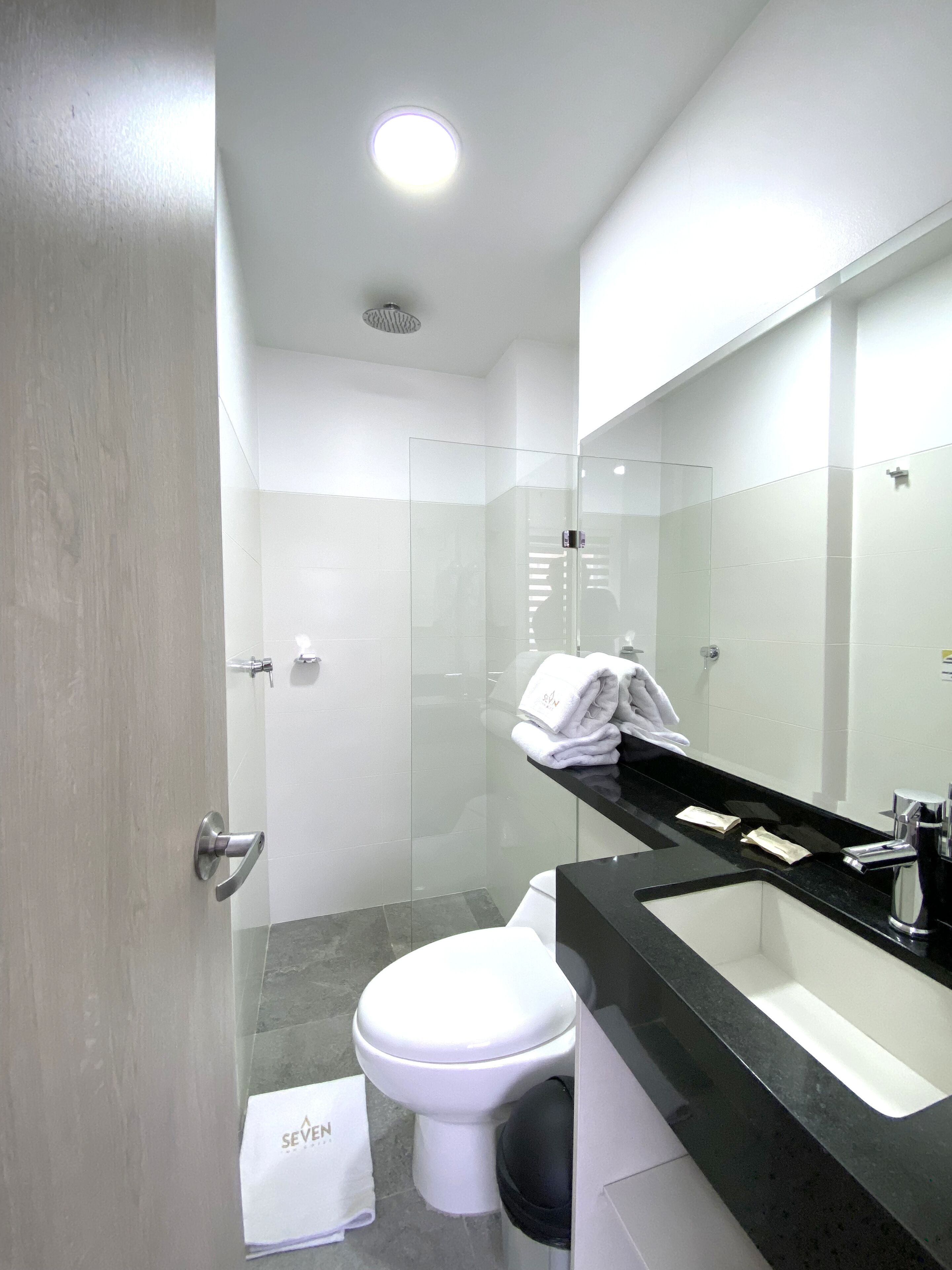 superior double room | bathroom | shower, rainfall showerhead, free toiletries, hair dryer