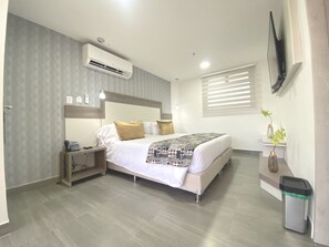 Studiosuite – deluxe | Minibar, safe på rommet, individuelt innredet og blendingsgardiner