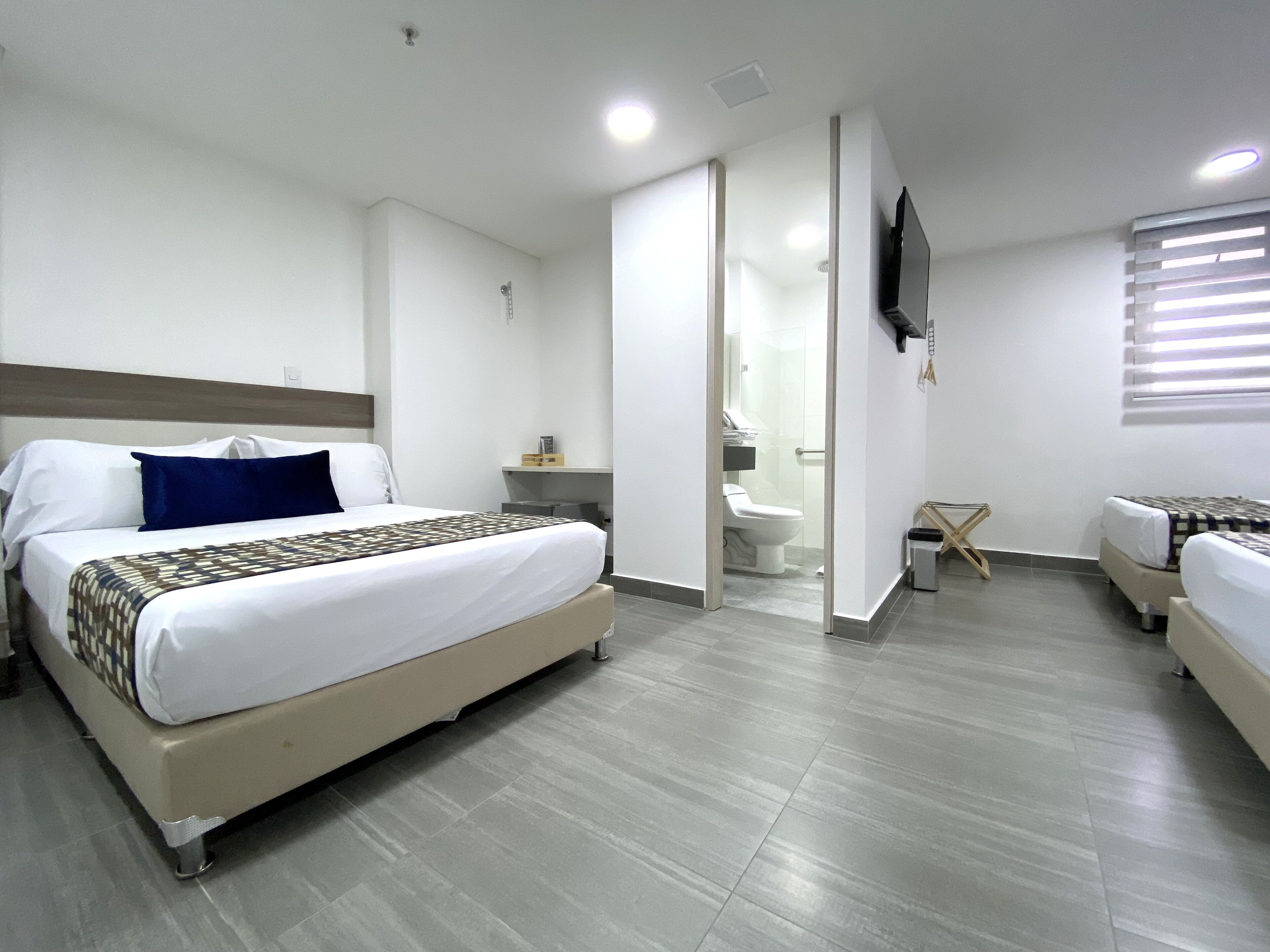 family quadruple room | 1 bedroom, minibar, in-room safe, individually furnished