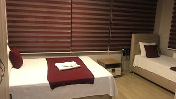 Standard Triple Room | 1 bedroom, minibar, in-room safe, soundproofing