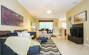 House, 4 Bedrooms | Living area | Flat-screen TV, DVD player - Crystal Cove - 4704 Blue By Fairytale VR (Kissimmee)