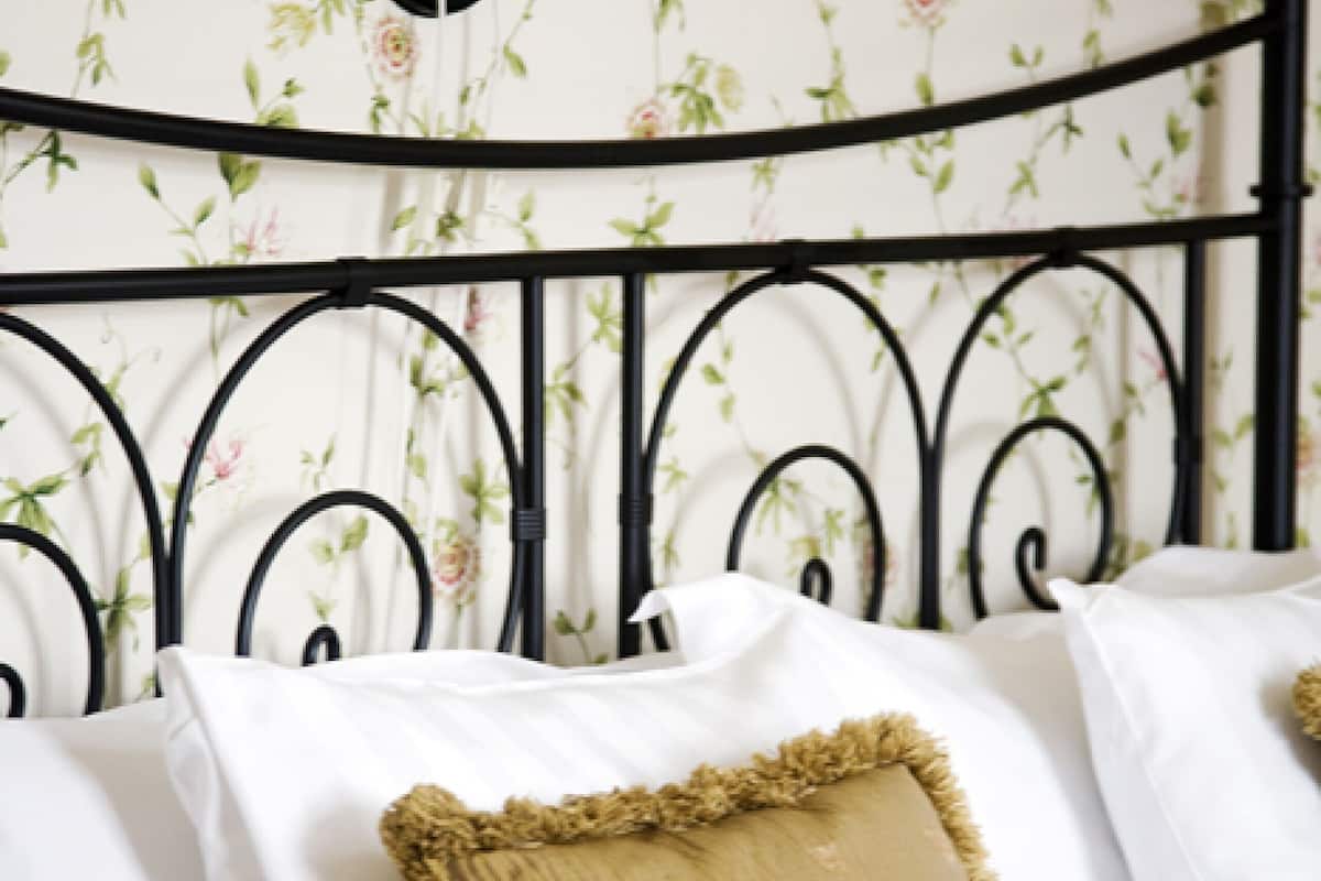 desk, laptop workspace, blackout curtains, cots/infant beds