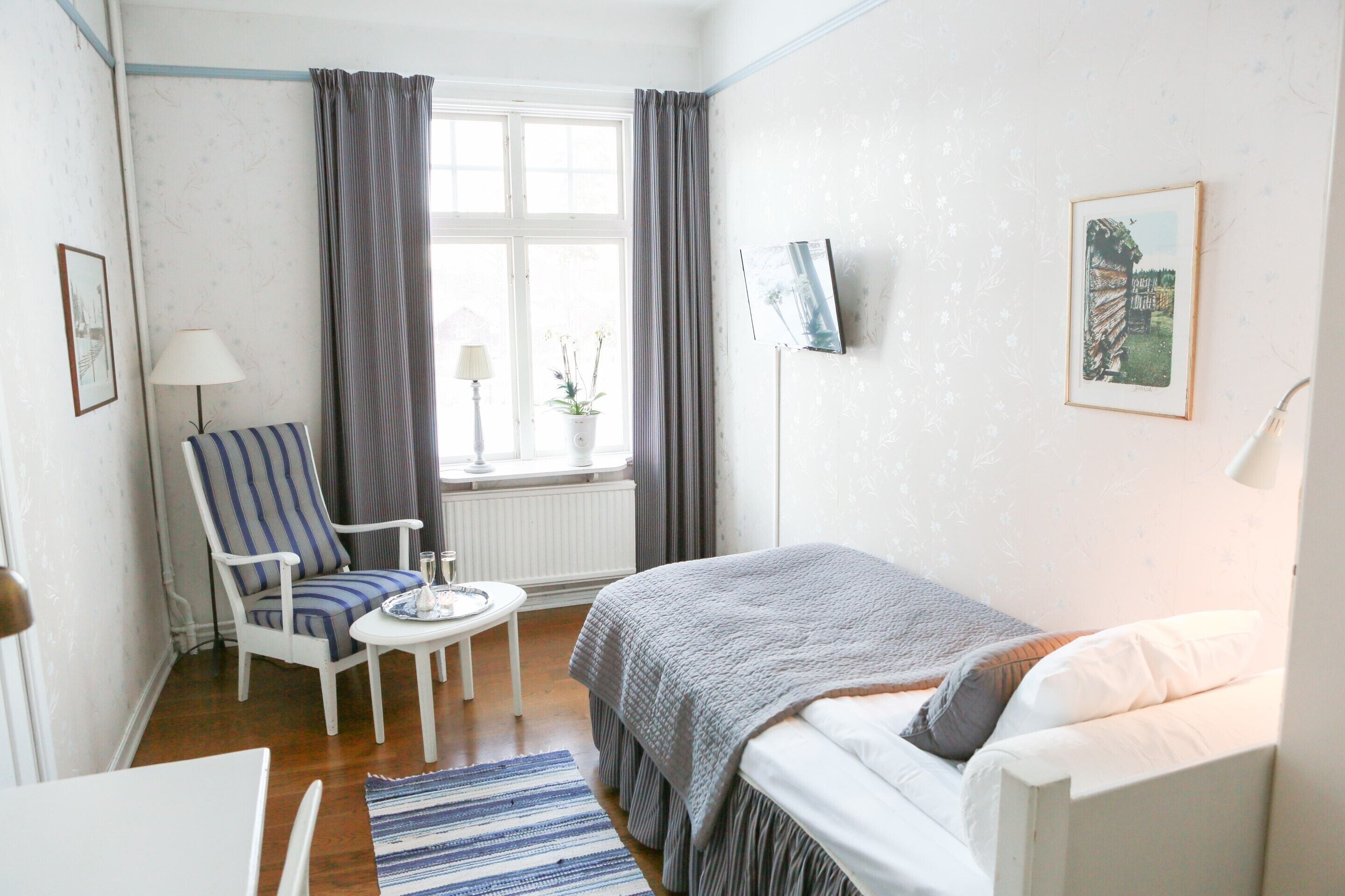 single room | desk, laptop workspace, blackout curtains, cots/infant beds