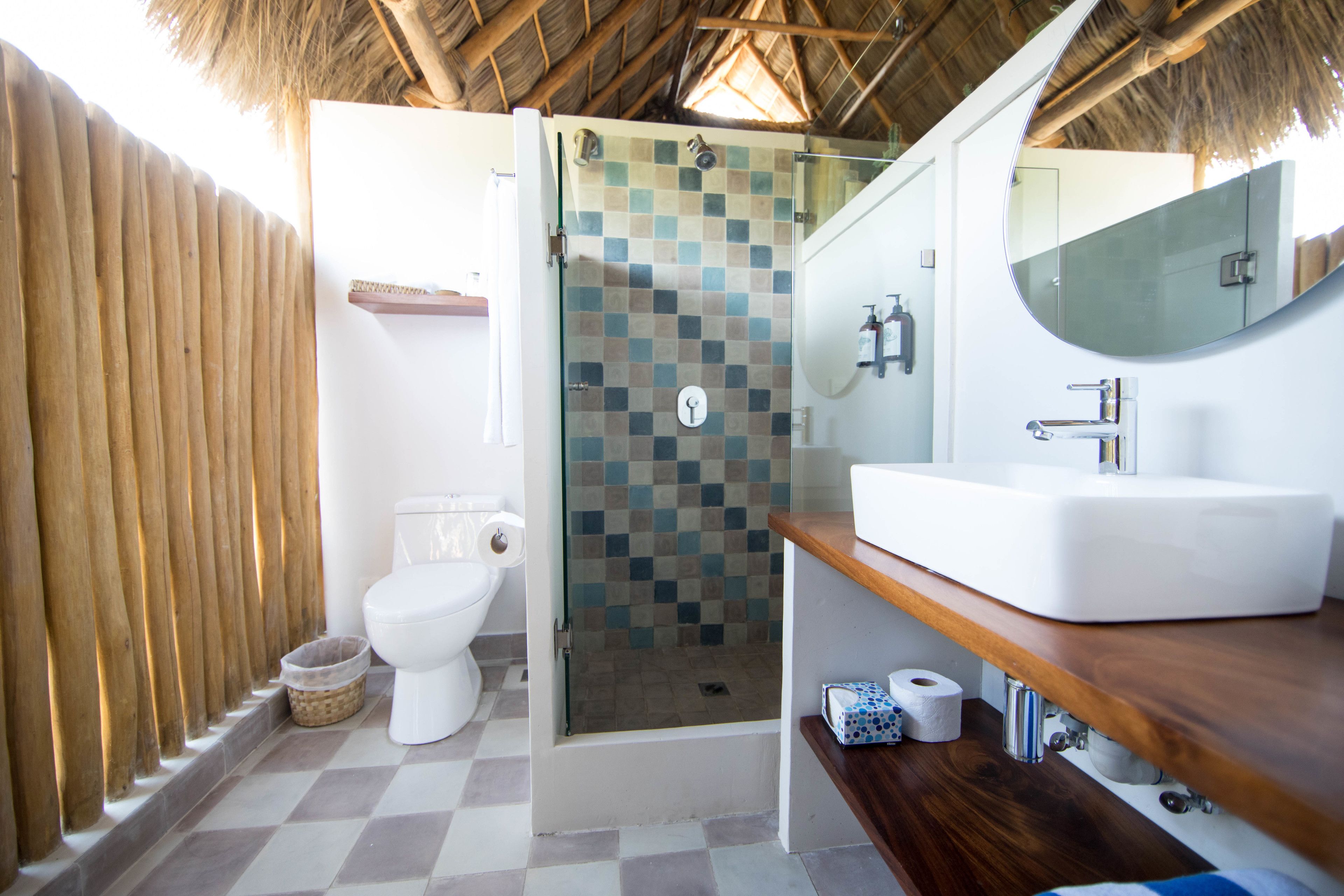 premium suite, hill view | bathroom | shower, eco-friendly toiletries, hair dryer, towels