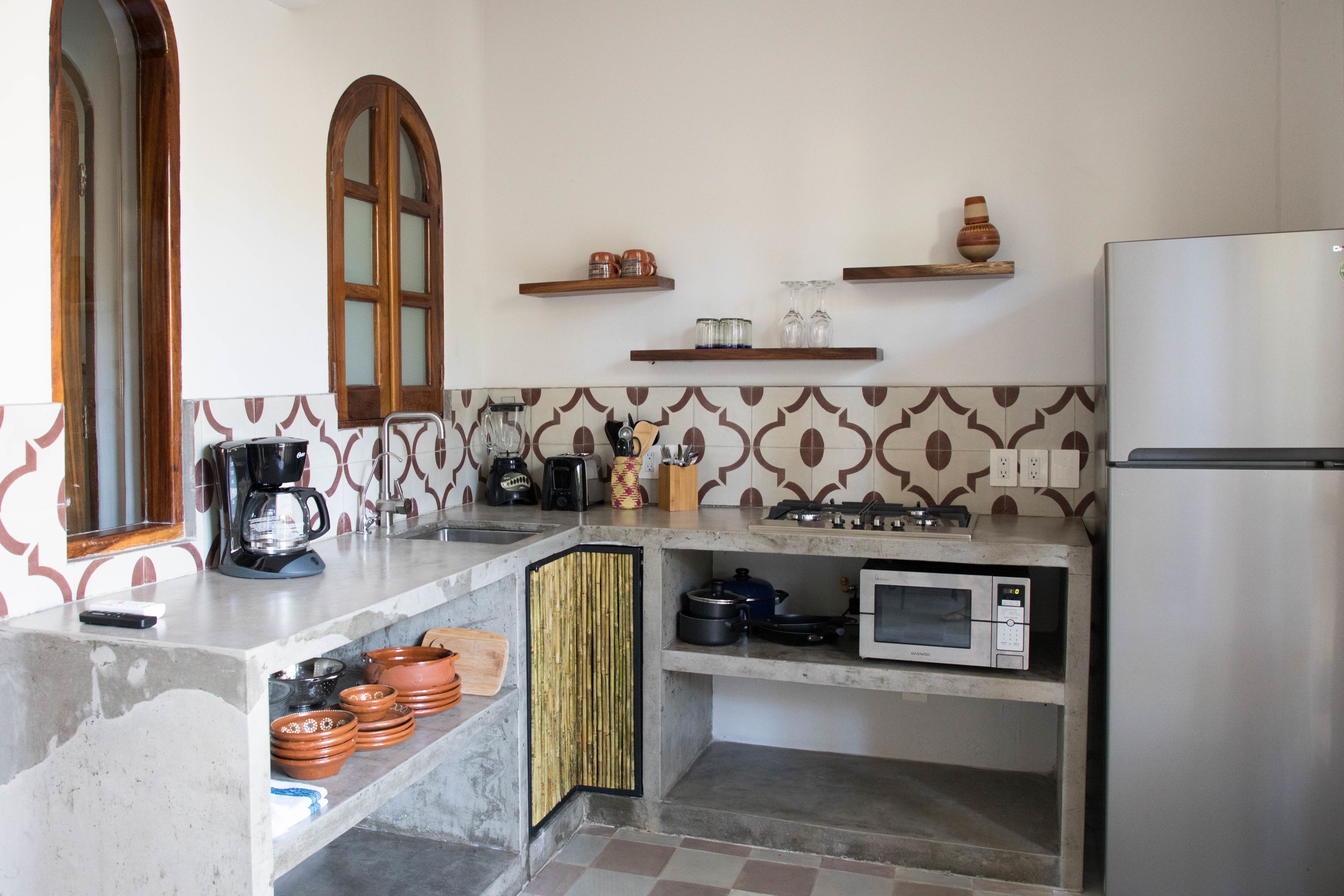 comfort suite, pool view | private kitchen | coffee/tea maker, reusable coffee/tea filters