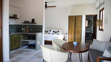 Standard Suite, Courtyard View | In-room safe, individually decorated, individually furnished, desk