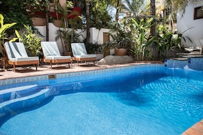 Outdoor pool, open 9:00 AM to 9:00 PM, sun loungers