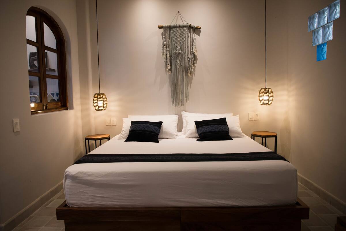 Standard Suite, Courtyard View | In-room safe, desk, laptop workspace, blackout drapes