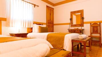 Family Room | Premium bedding, down duvets, desk, laptop workspace