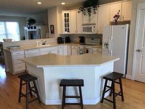 Microwave, dishwasher, coffee/tea maker, cookware/dishes/utensils