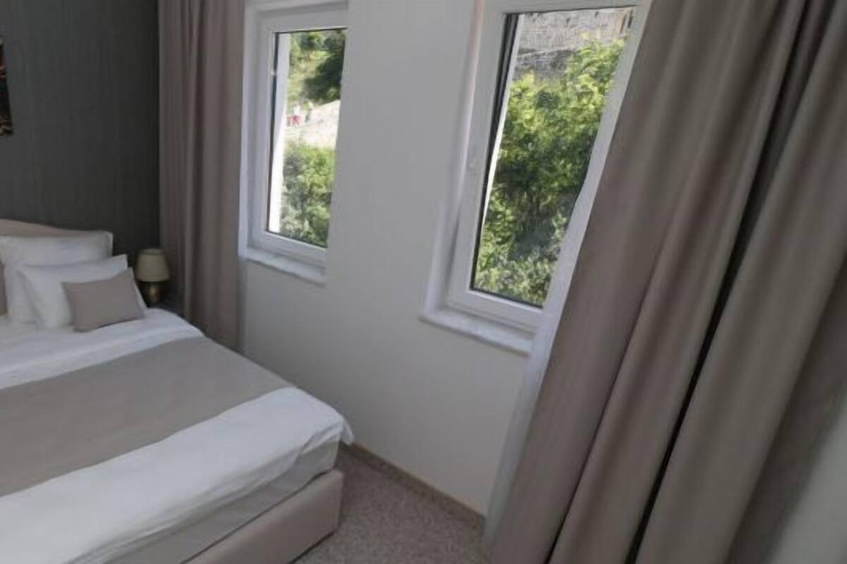 Family Suite, City View | In-room safe, individually decorated, individually furnished
