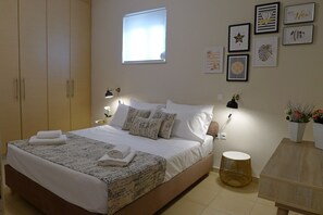 1 bedroom, desk, iron/ironing board, travel cot