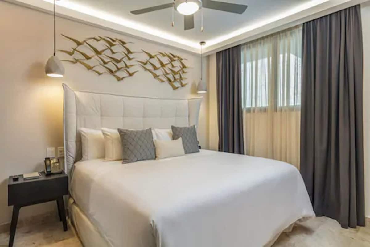 Premium bedding, in-room safe, blackout curtains, iron/ironing board