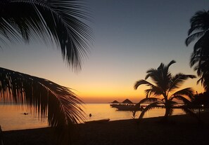 On the beach, sun-loungers, beach towels