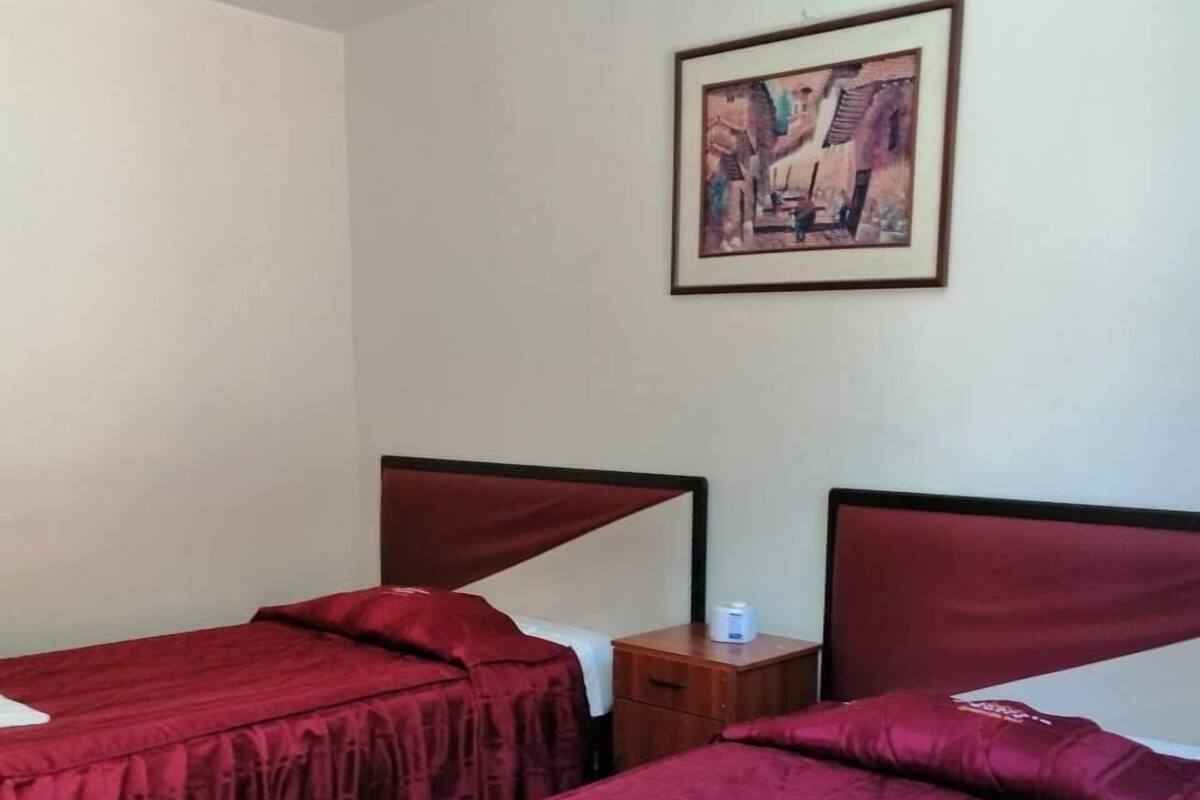 Doppel- oder Zweibettzimmer