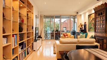 House, 4 Bedrooms | Living area | Flat-screen TV