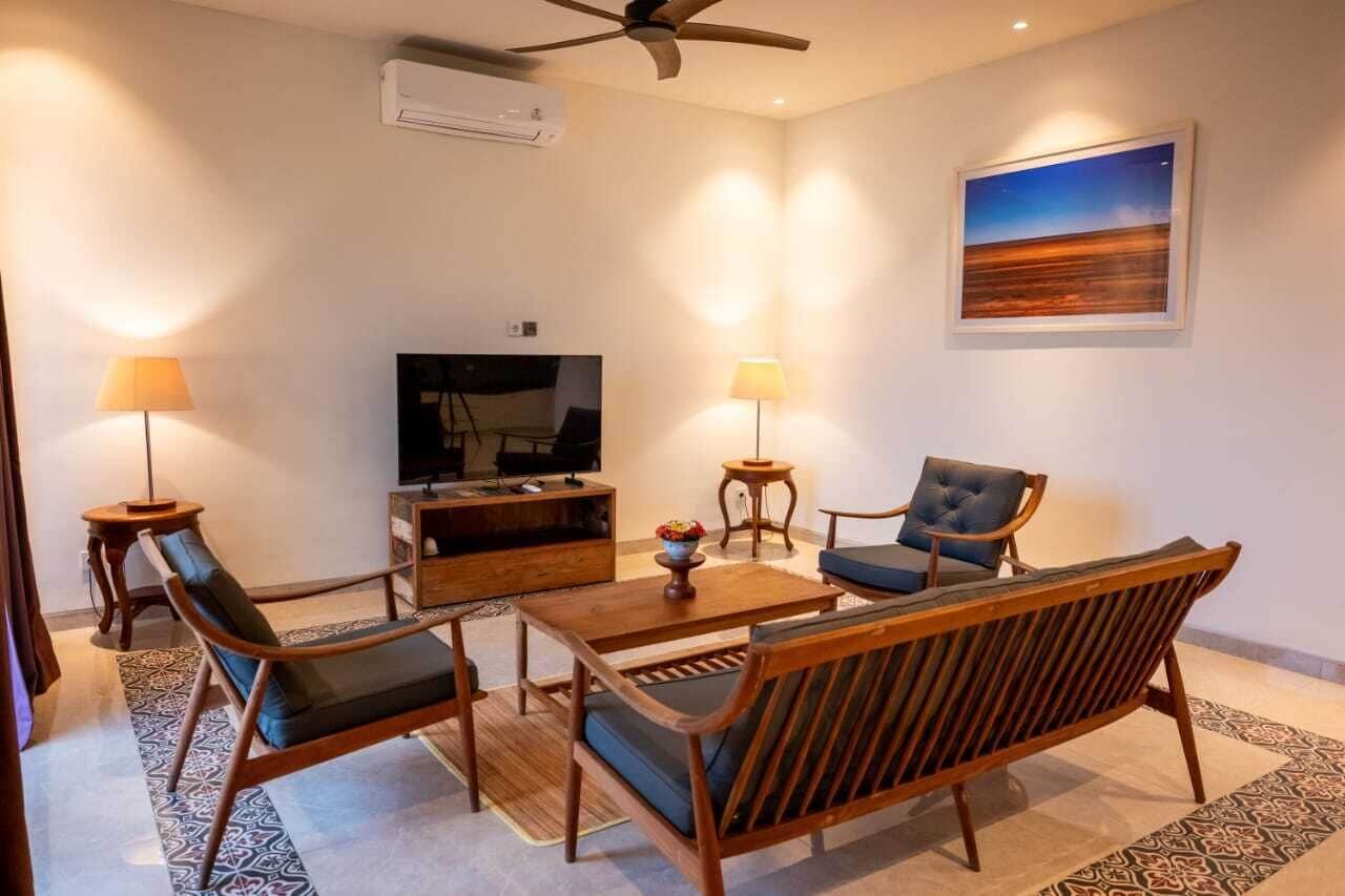 Apartemen Comfort | Ruang keluarga | TV layar datar