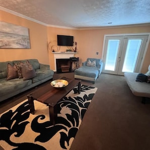Deluxe Villa, 2 Bedrooms, Non Smoking, City View | Living area | 40-inch Smart TV with cable channels, TV, fireplace - The Stone Crest Villa - Near Stone Mountain Park (Lithonia)