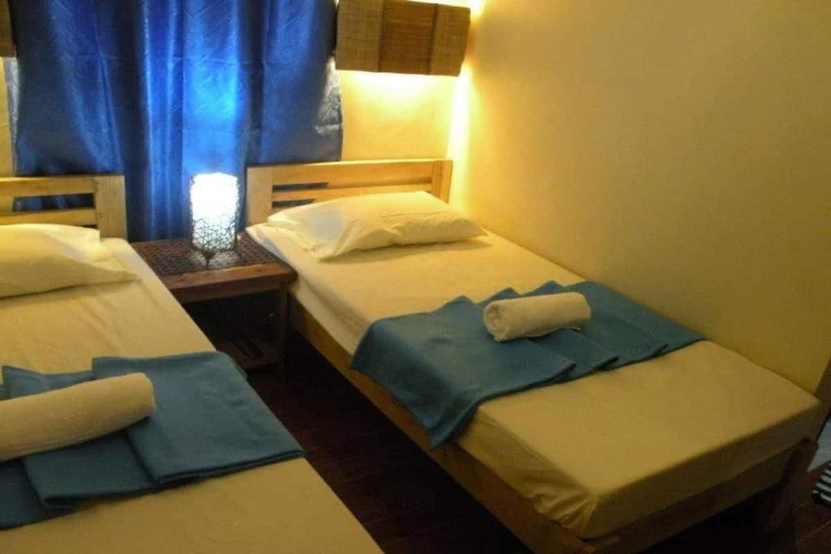 Standaard Twin kamer | Verduisterende gordijnen, extra bedden, beddengoed