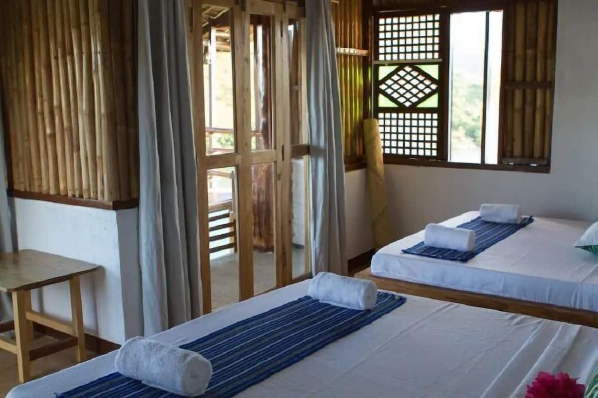 Desk, blackout curtains, soundproofing, bed sheets