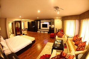 Elite Room, 1 King Bed, Garden View | Living room | LED TV - aayuah resort (Panvel)