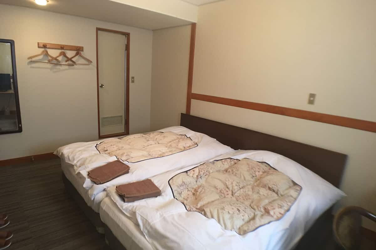 Desk, WiFi (free), bed sheets