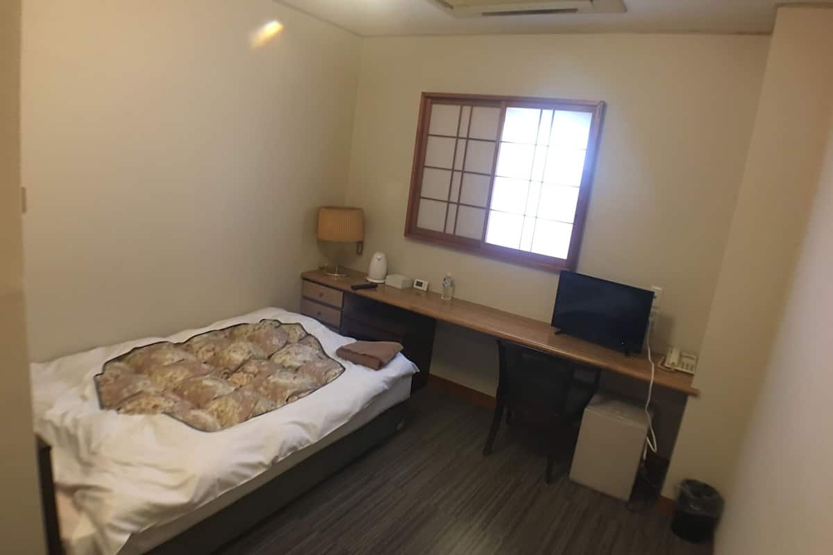 Desk, WiFi (free), bed sheets
