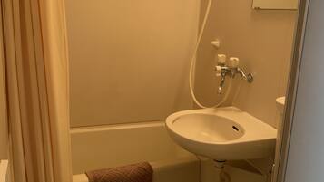 Combined shower/tub, deep soaking tub, free toiletries, hair dryer