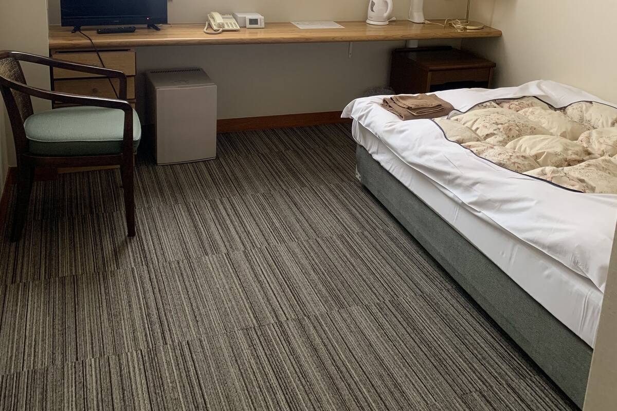 Habitación individual | Escritorio, wifi gratis, ropa de cama