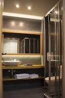 Shower, free toiletries, hair dryer, slippers