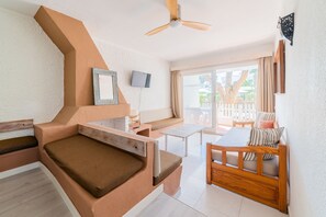 Standard Duplex, 2 Bedrooms | Living area | 26-inch flat-screen TV with digital channels, LCD TV