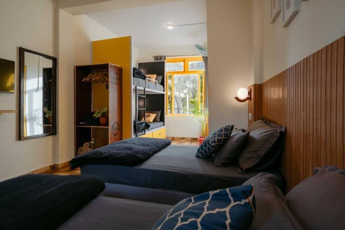 Deluxe vierpersoonskamer | Verduisterende gordijnen, gratis wifi, beddengoed