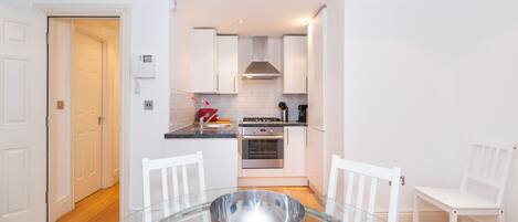 Apartment, 2 Bedrooms | Living area | Flat-screen TV