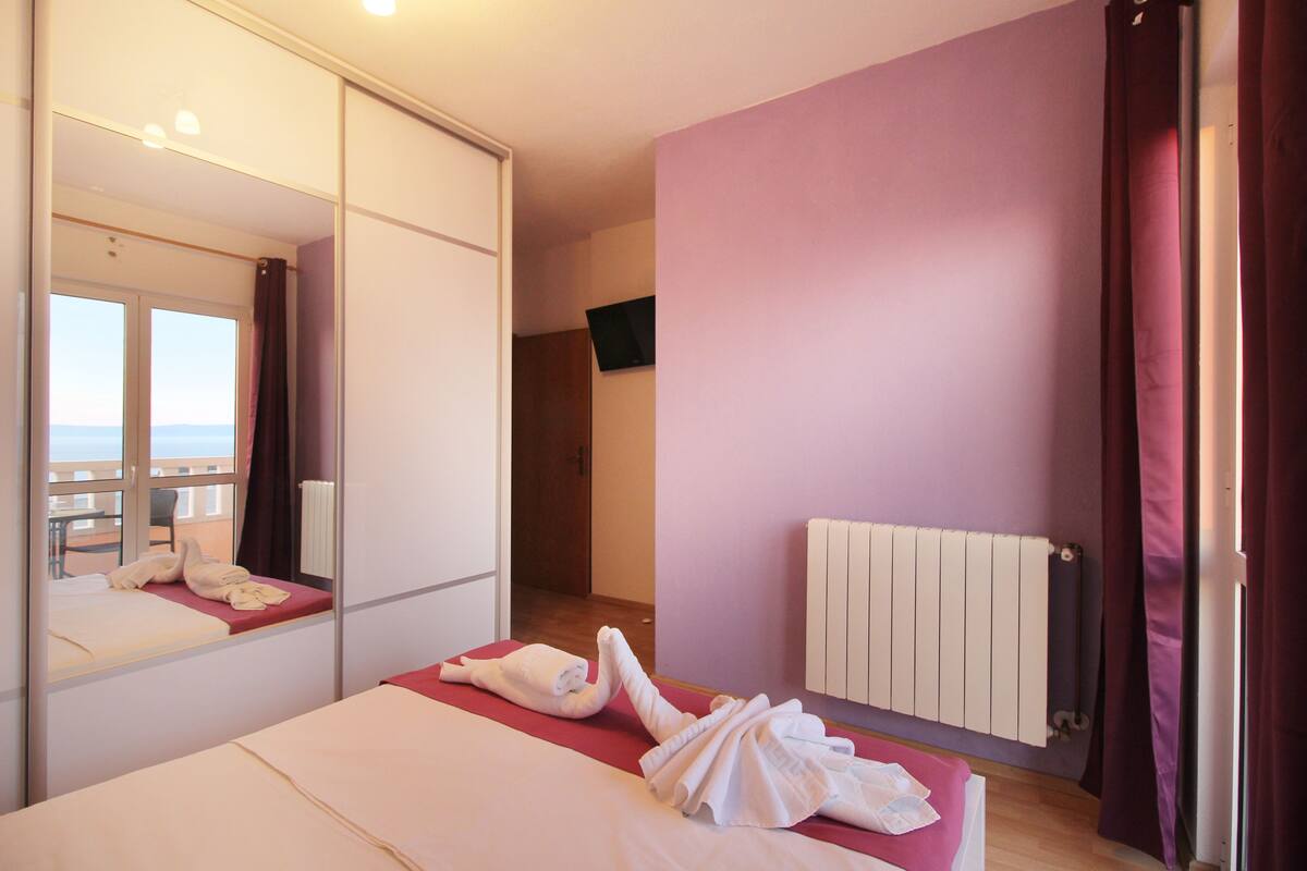 Apartment, 3 Bedrooms, Sea View | 2 bedrooms, desk, laptop workspace, iron/ironing board