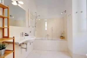 Apartment, 1 Bedroom | Bathroom | Combined shower/tub, deep soaking tub, rainfall showerhead - Giulia Charme - My Extra Home (Rome)