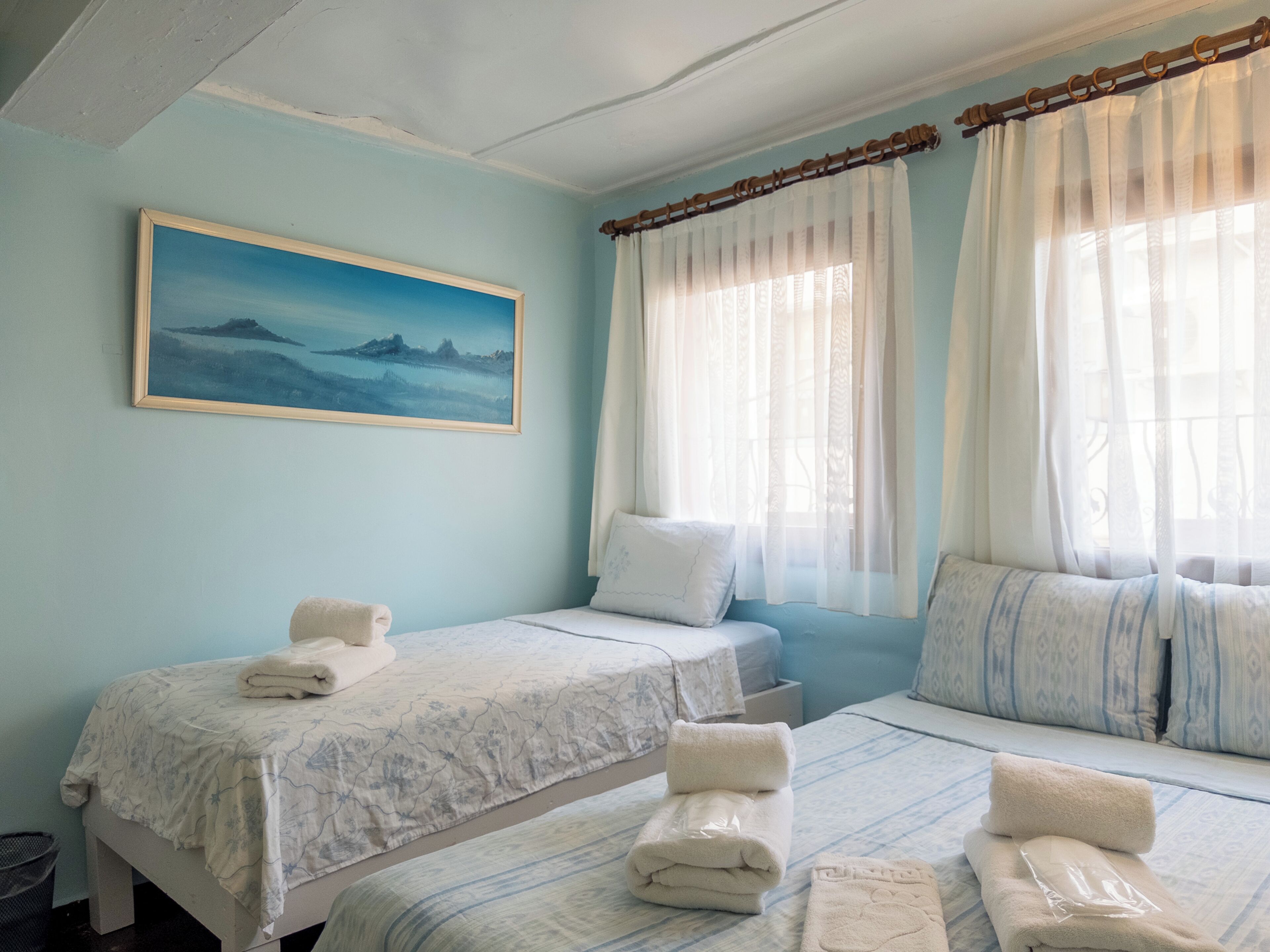 Economy Triple Room | Premium bedding, iron/ironing board, free WiFi, bed sheets