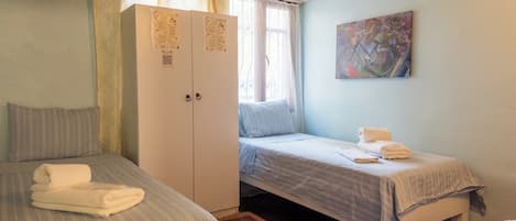 Economy Twin Room | Premium bedding, iron/ironing board (on request), WiFi (free)
