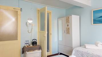 Ropa de cama de alta calidad y tabla de planchar con plancha