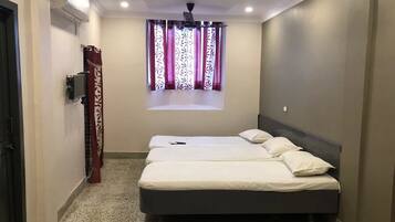 Deluxe Double Room, 1 Bedroom, Smoking, City View | Soundproofing, iron/ironing board, free WiFi, bed sheets