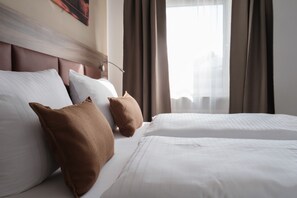 Desk, blackout curtains, soundproofing, free WiFi