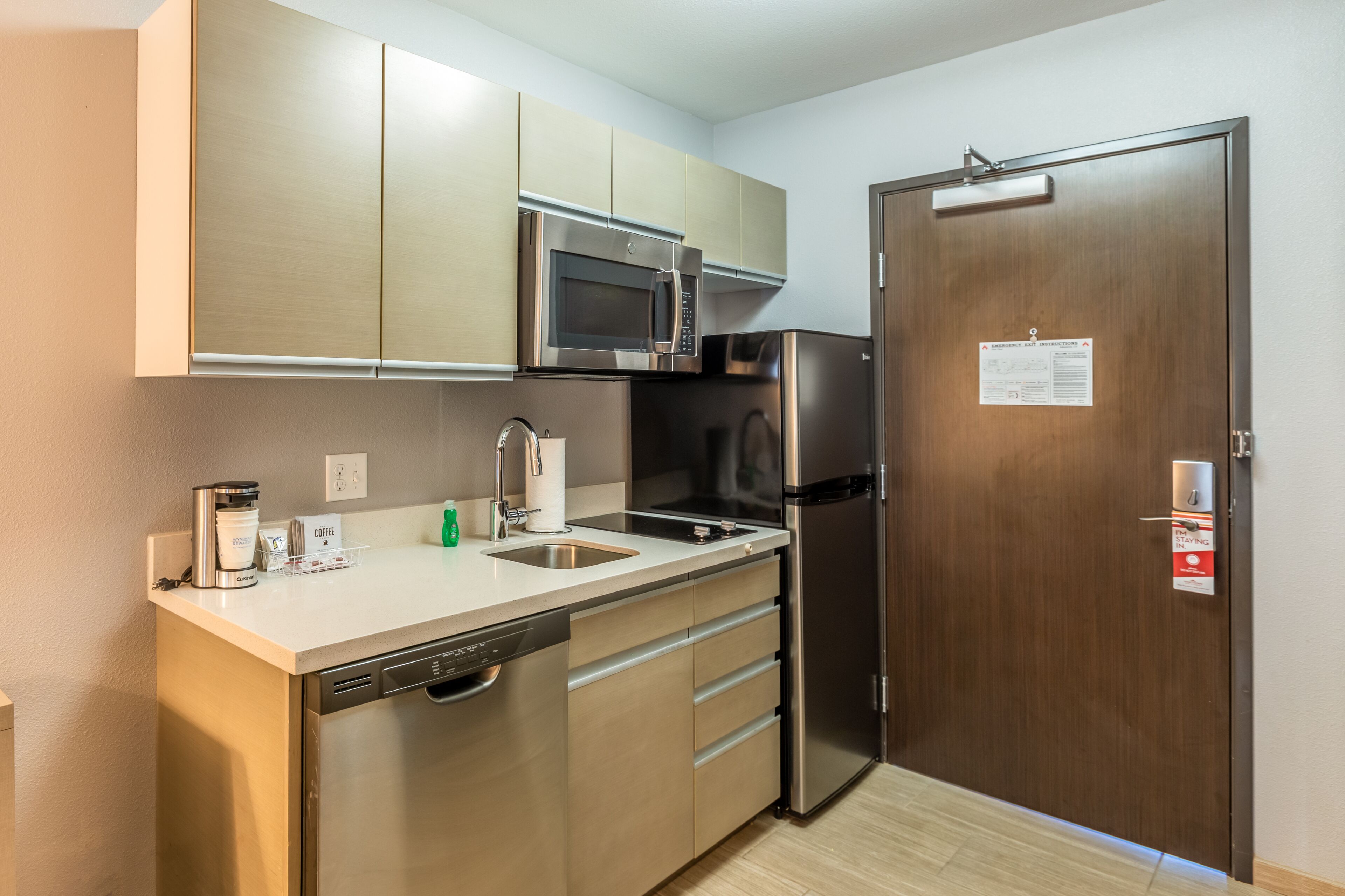 full-sized fridge, microwave, stovetop, dishwasher