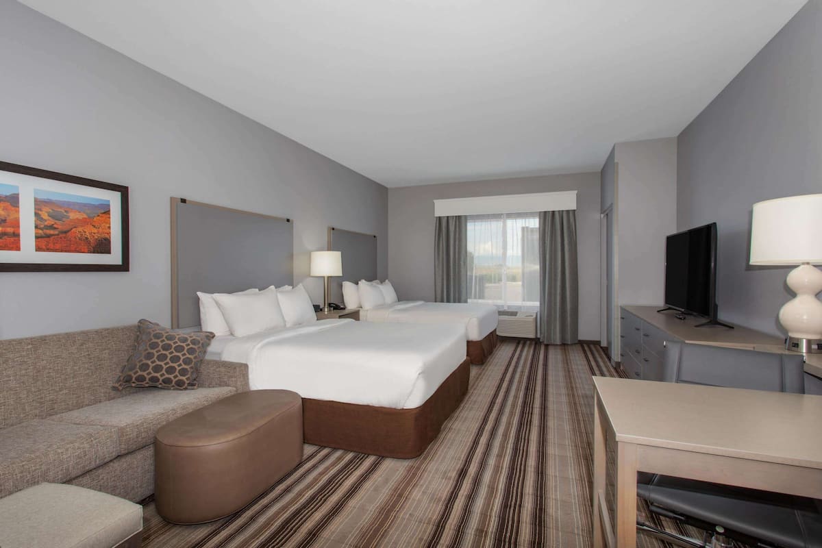 Hypo-allergenic bedding, pillow-top beds, in-room safe