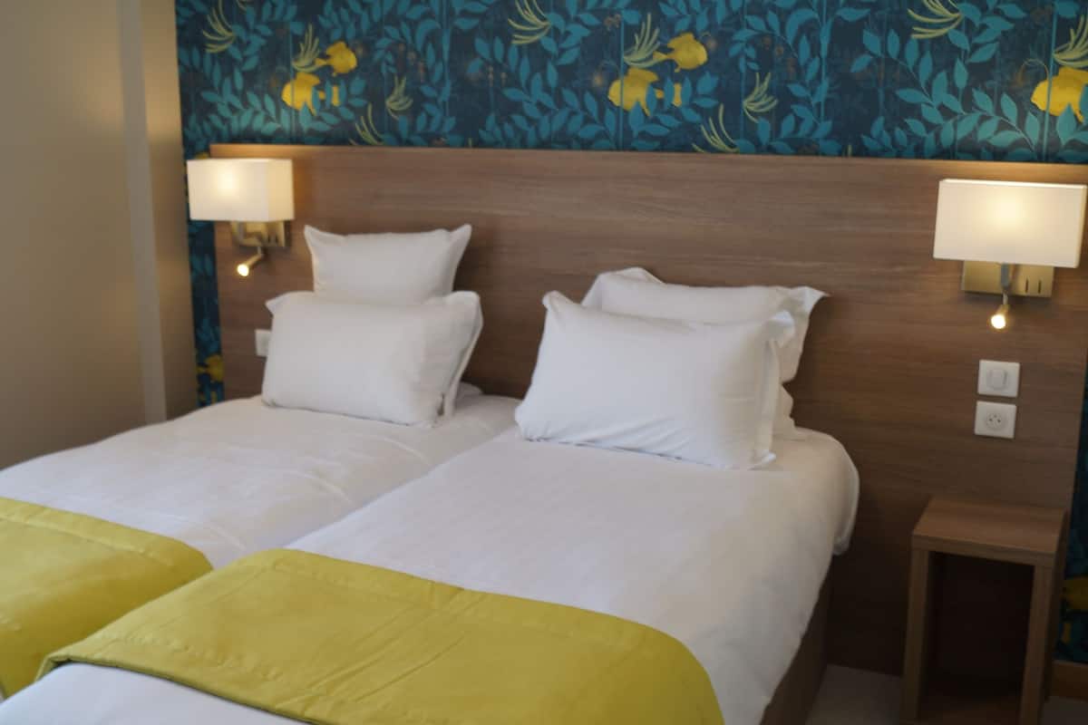 twin room (vue eglise pmr) | premium bedding, in-room safe, desk, laptop workspace