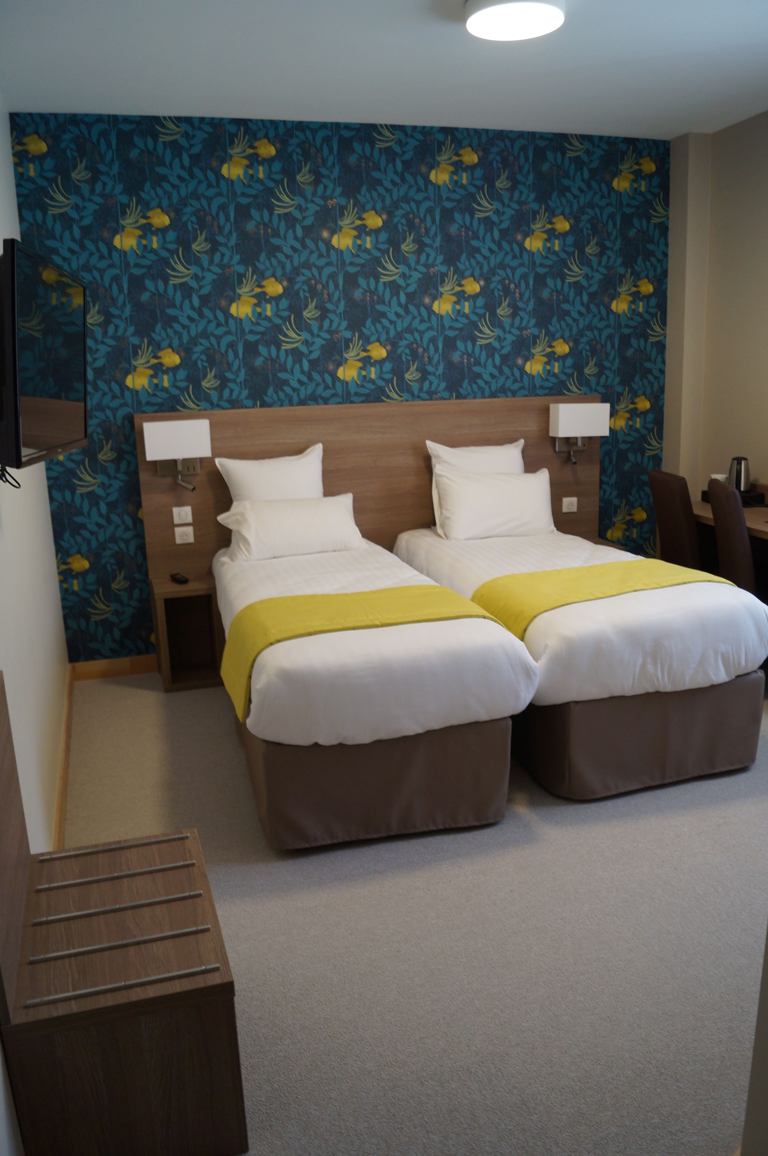 twin room (vue eglise pmr) | premium bedding, in-room safe, desk, laptop workspace