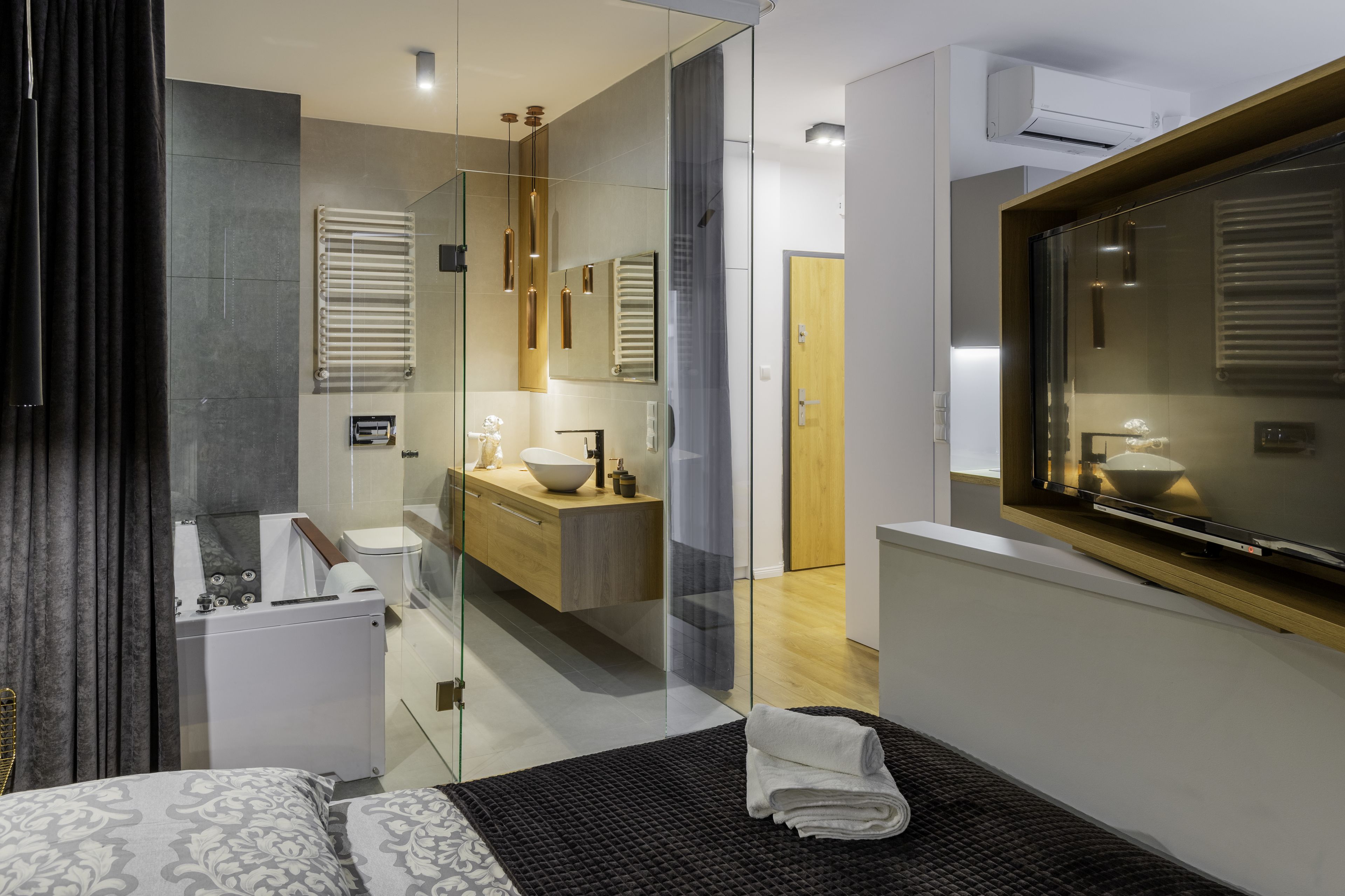 Jetted tub, hydromassage showerhead, designer toiletries, hair dryer