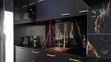 Panoramic Studio Suite, 1 Queen Bed with Sofa bed, City View | Private kitchen | Full-size fridge, microwave, stovetop, dishwasher