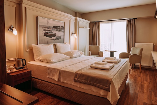 Habitación triple estándar | Minibar, wifi gratis y ropa de cama